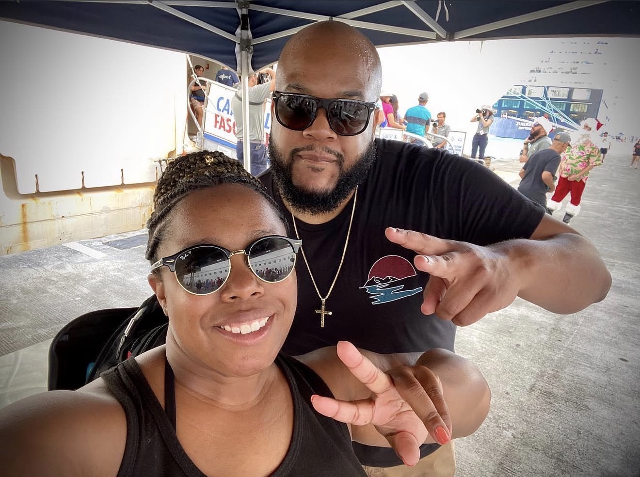 Ta'Keisha and Sixto at the cruise terminal before boarding