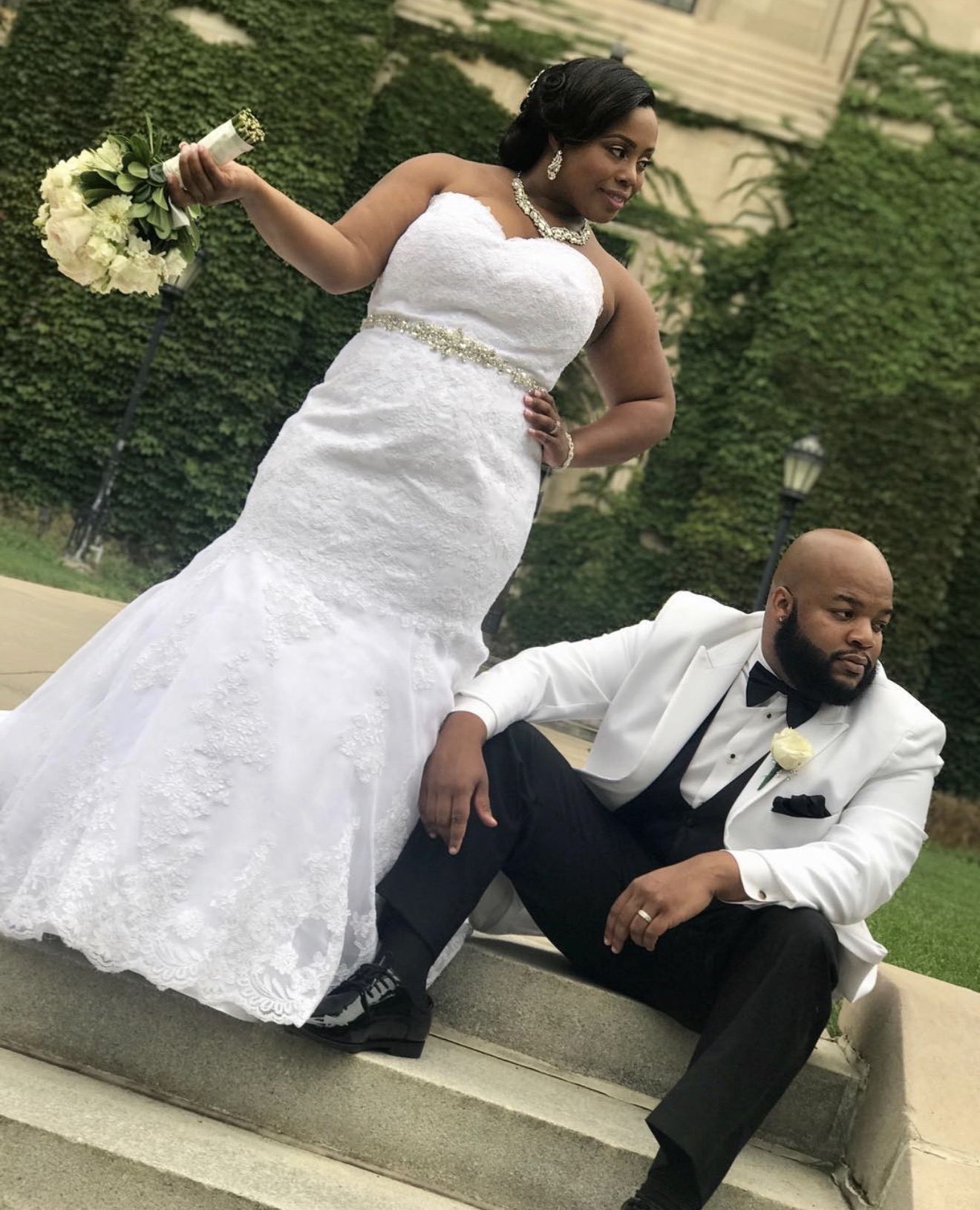 Ta'Keisha and Sixto posing on the chapel steps on their wedding day