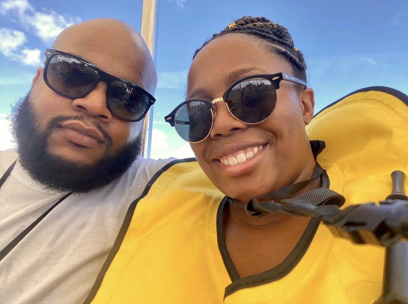 The couple in life vests during a shore excursion