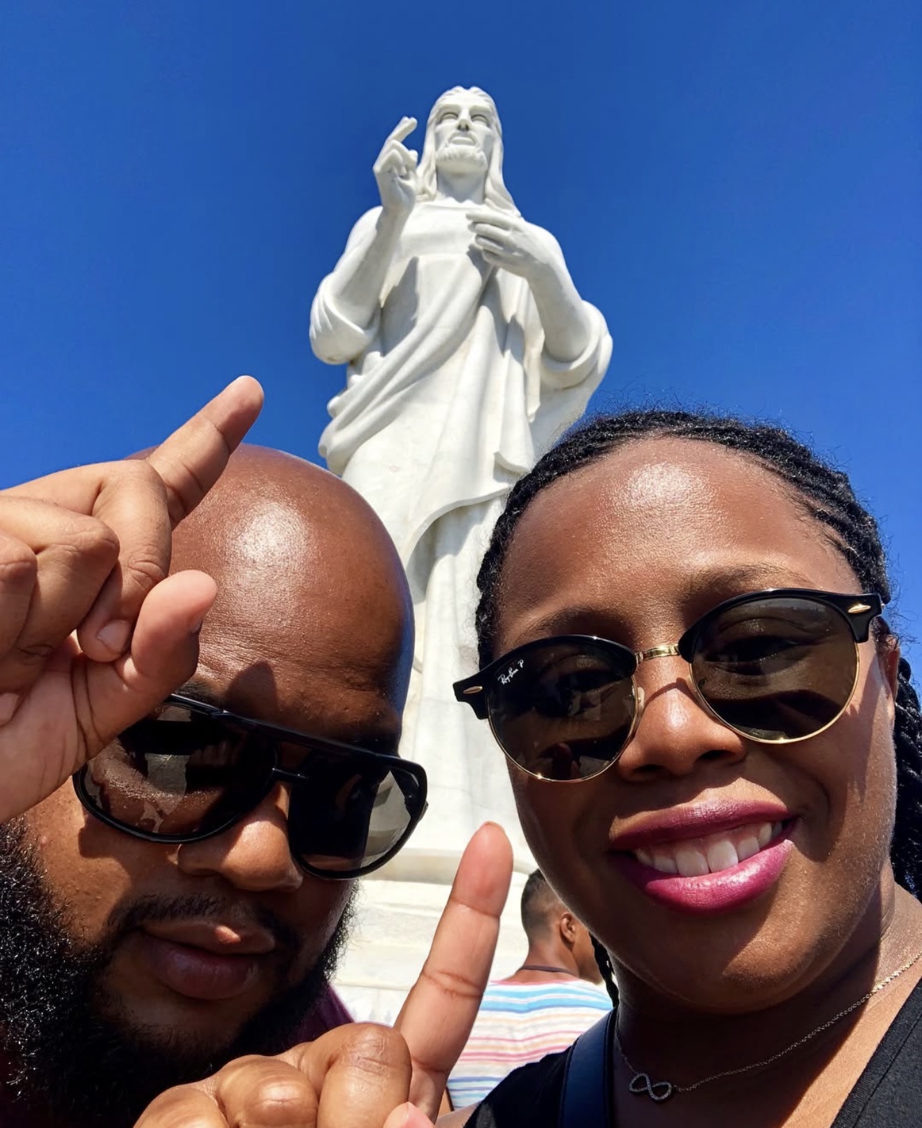 The couple at the Christ of Havana statue