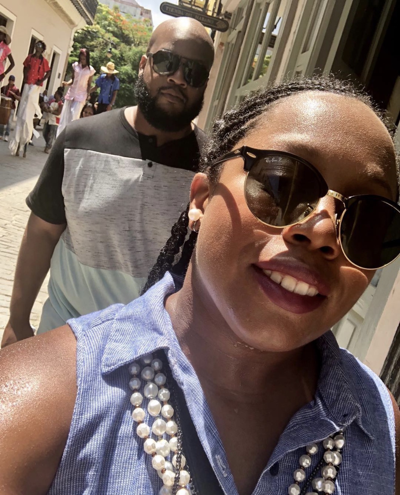 Walking a sunny street in Old Havana
