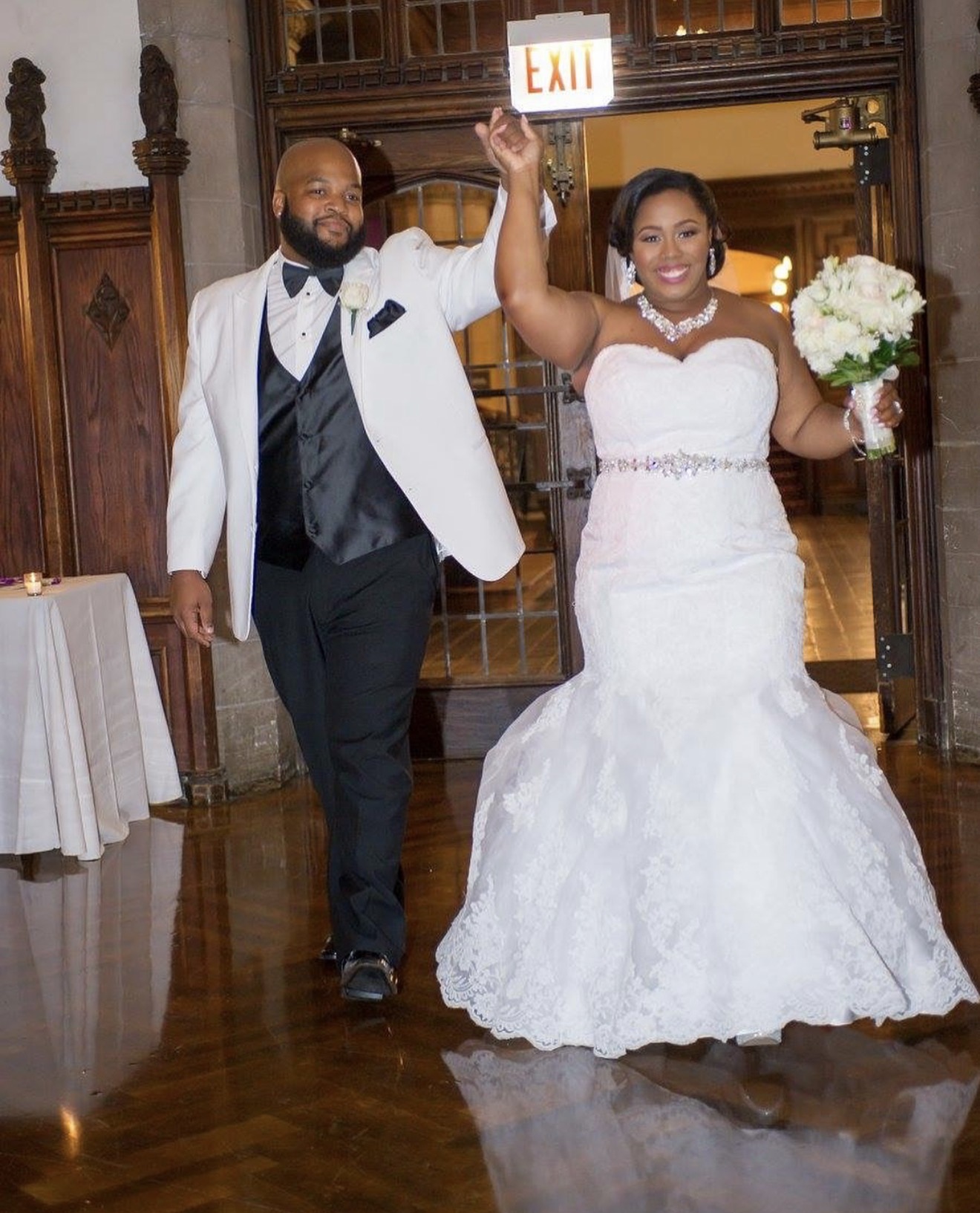 The couple making their grand entrance into the wedding reception